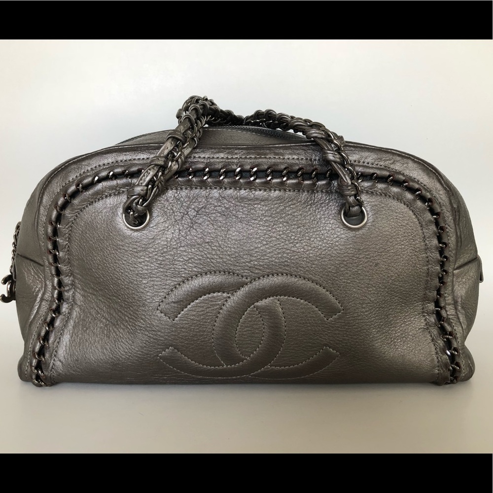 Chanel purse metallic grey in excellent condition.